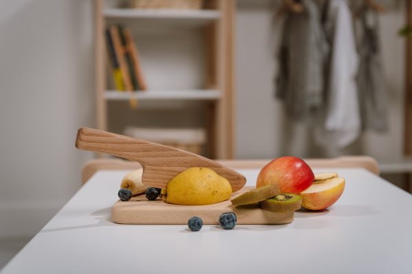 Chopping board with knife in a setting