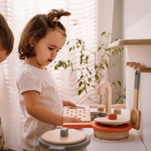 pot and pan in a setting with children