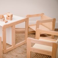 white table and two chairs in mixed colors