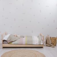 Montessori floor bed in a setting
