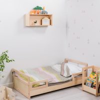 Montessori floor bed with slats in a setting