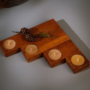 Wooden tealight holder set in IROKO laid out