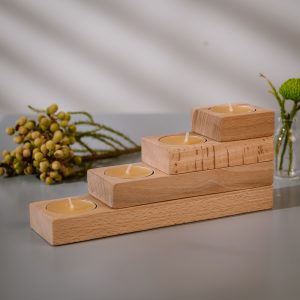 Wooden tealight holder set in NATURAL stacked up
