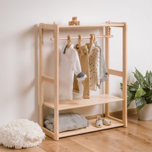 Clothing rack type B with shelf in natural, in a setting