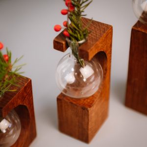 Test tube vase in Teak close up